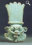 132) Cabeza del dios egipcio Bes