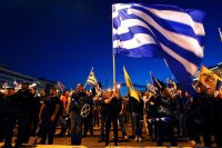 Supporters of the extreme-right Golden Dawn party sing the Greek national anthem during a rally in May commemorating Constantinople’s fall in 1453. Credit Yorgos Karahalis/Reuters