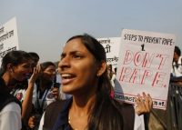 Students from various colleges holding placards as they shout slogans during rally against gender discrimination and violence towards women in Mumbai December 10, 2014. (Shailesh Andrade/Reuters)