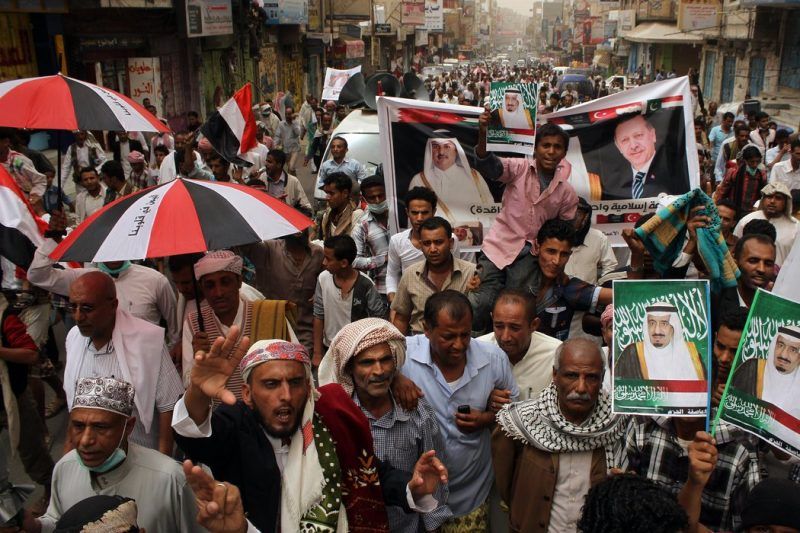 Yemenis marching in the southwestern city of Taiz in favor of the Saudi-led coalition that is battling Shiite Houthi rebels. Credit Agence France-Presse — Getty Images
