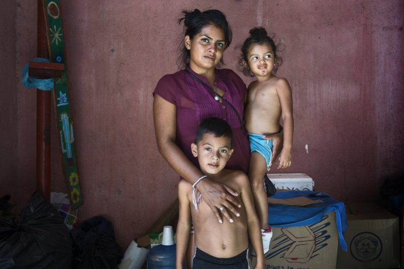  July Elizabeth Pérez with one of her daughters, 3-year old Kimberly Julieth Medina, and her only living son, 6-year-old Luis Danny Pérez, at the Hermanos en el Camino shelter in Ixtepec, Mexico. Credit Kate Orlinsky for The New York Times 