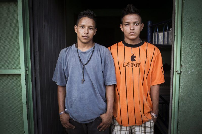  Willmer Villatoro, 16, and his brother Alexis Villatoro, 18, at the Hermanos en el Camino shelter. They fled gangs in El Salvador after Willmer was shot for not joining them. Credit Katie Orlinsky for The New York Times 