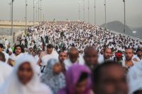 Hundreds of thousands of Muslim pilgrims make their way to cast stones at a pillar symbolizing the stoning of Satan, in a ritual called “Jamarat,” the last rite of the annual hajj, on the first day of Eid al-Adha in Mina near the holy city of Mecca, Saudi Arabia on Sept. 24. (Mosa'ab Elshamy/Associated Press)