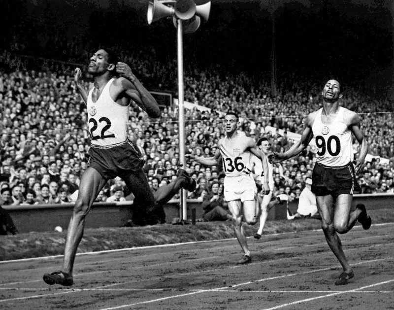Arthur Wint of Jamaica, left, winning the men’s 400 meters at the London Olympic Games in 1948. Herb McKenley of Jamaica, right, won the silver medal, and Mal Whitfield of the United States, center, won the bronze. Associated Press