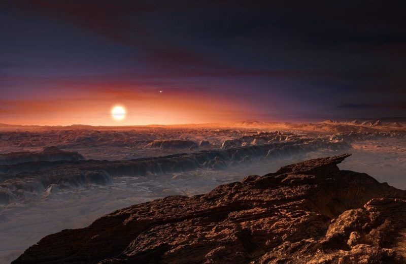 This artist rendering shows a view of the surface of the planet Proxima b orbiting the red dwarf star Proxima Centauri, the closest star to the Solar System. M. Kornmesser/European Southern Observatory