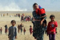 Yazidis fleeing the Islamic State near Sinjar, Iraq, in August, 2014. Rodi Said/Reuters