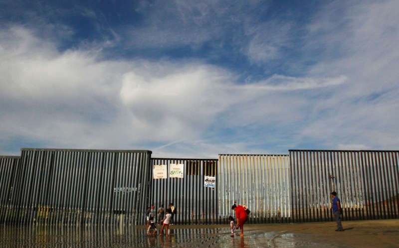 A fence separating Mexico and the United States, at Tijuana, Mexico, this month. Credit Jorge Duenes/Reuters
