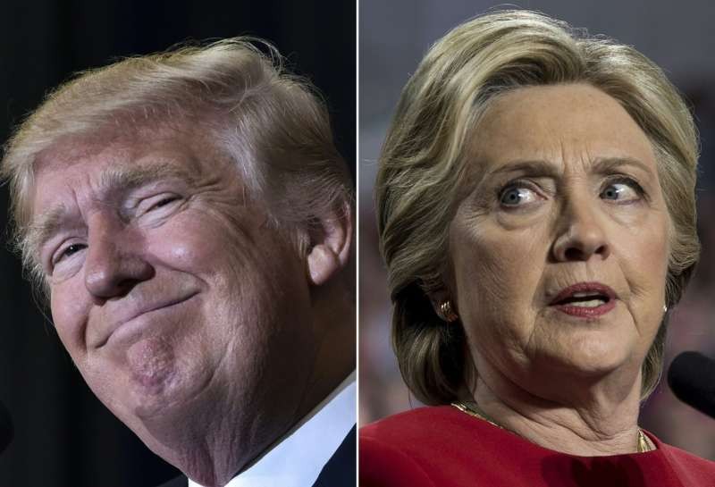The US president-elect Donald Trump and beaten Democrat candidate Hillary Clinton: ‘She did not do Michigan the courtesy of one visit while campaigning.’ Photograph: Mandel Ngan/AFP/Getty Images
