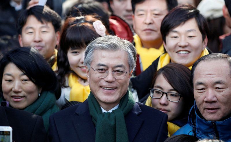 The Democratic Party standard-bearer, Moon Jae-in, center, maintains a lead in South Korea’s presidential election polls. Credit Kim Hong-Ji/Reuters