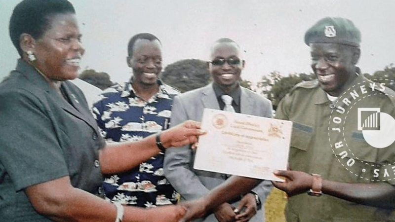 A photo taken as a Certificate of Appreciation is presented for services rendered by the Arrow Boys during the LRA campaign at a ceremony in December 2004. CRISIS GROUP/Magnus Taylor