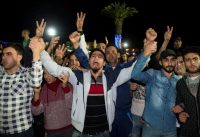 Protesters gesture and shout slogans in the northern Moroccan city of Al Hoceima on Oct. 30. (Fadel Senna/Agence France-Presse via Getty Images)
