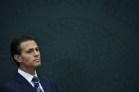 El presidente Enrique Peña Nieto luego del anuncio de la creación de nuevas unidades para prevenir conflictos de interés dentro de la Secretaría de la Función Pública, el 3 de febrero de 2015 YURI CORTEZ/AFP/Getty Images