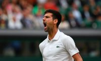 Novak Djokovic reacting to a point in his fourth round match at Wimbledon on Tuesday. Glyn Kirk/Agence France-Presse — Getty Images