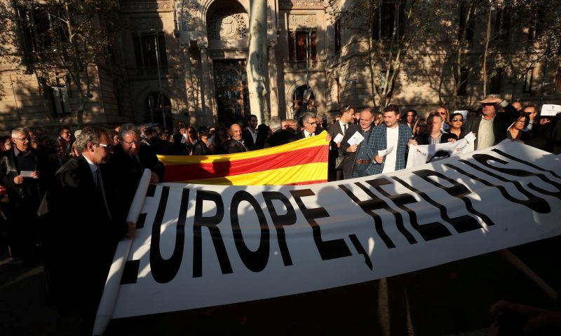 Lawyers and attorneys gather outside Catalonia’s supreme court in support for the banned independence referendum in Barcelona. Photograph: Albert Gea/Reuters