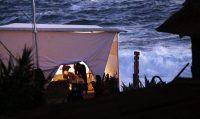 A forensic team preparing for the exhumation of the poet Pablo Neruda’s remains at his former seaside home of Isla Negra, west of Santiago, Chile, in 2013. Forensic experts concluded this month that Neruda did not die from cancer. Credit Felipe Trueba/European Pressphoto Agency