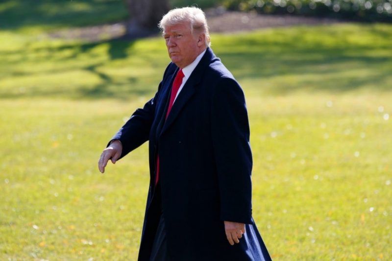 President Trump walks to board Marine One on the South Lawn of the White House on Wednesday in Washington. (Evan Vucci/Associated Press)