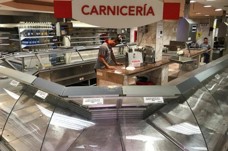 Empty meat counters in a supermarket in Caracas, Venezuela, on Jan. 9. (Marco Bello/Reuters)