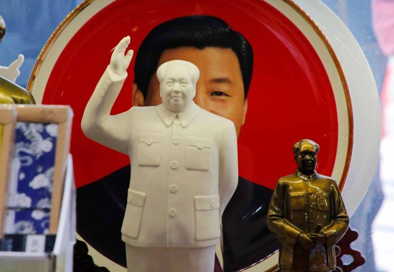 Jason Lee/Reuters Sculptures of Mao Zedong in front of a souvenir plate with a portrait of Chinese President Xi Jinping, Tiananmen Square, Beijing, March 1, 2018