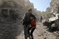 Evacuating the rebel-held enclave of Douma, Syria, on March 20 after shelling by Syrian and allied forces. Iranian proxies have led the fight to take back cities like Homs and areas around Damascus. Credit Hamza Al-Ajweh/Agence France-Presse — Getty Images