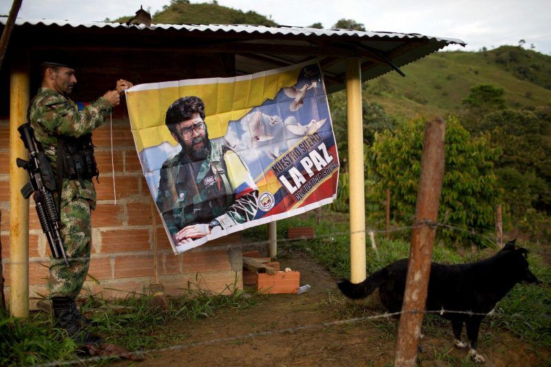 A rebel fighter with the Revolutionary Armed Forces of Colombia, or FARC, in a hidden camp in northwest Colombia, in January 2016.Credit Rodrigo Abd/Associated Press