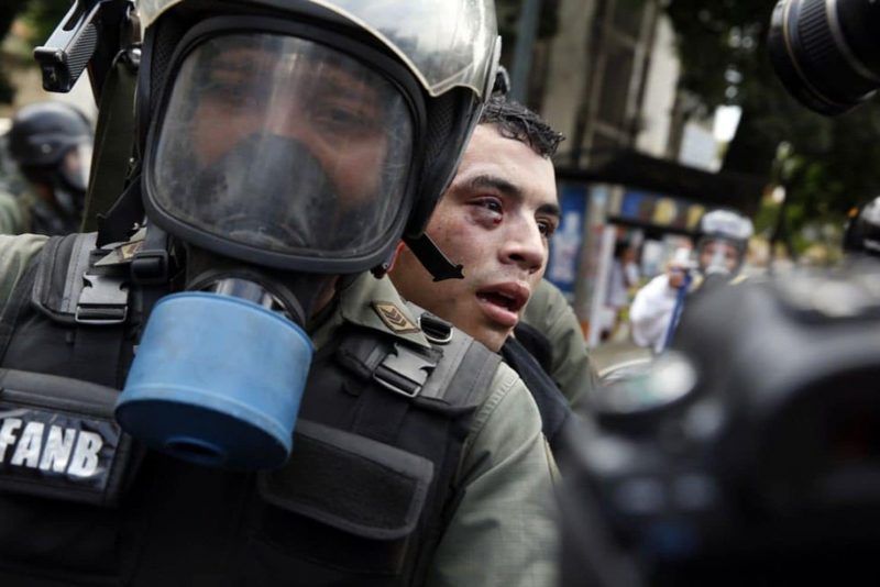 Venezuelan security forces have detained thousands of demonstrators. (Carlos Garcia Rawlins/Reuters)