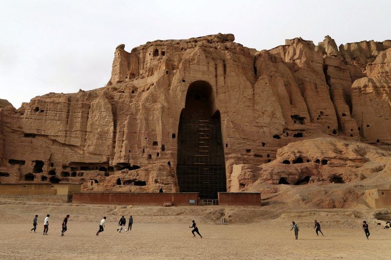 Boys play soccer in Bamian, Afghanistan where the Taliban destroyed one of two ancient Buddha statues in 2001.Credit Shefayee/Agence France-Presse — Getty Images