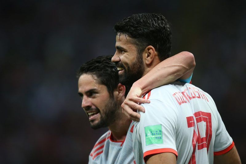 Isco y Diego Costa celebran el gol de España en el partido contra Irán Credit Roman Kruchinin/Agence France-Presse — Getty Images 