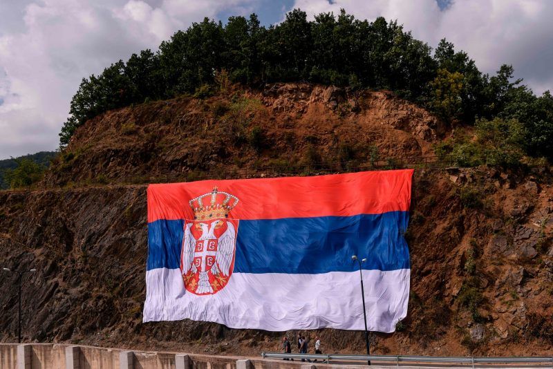 A giant Serbian national flag was hung prior to the visit of Serbian president, Aleksandar Vucic, to Gazivode Lake in Kosovo on September 8, 2018. Armend Nimani/Agence France-Presse — Getty Images