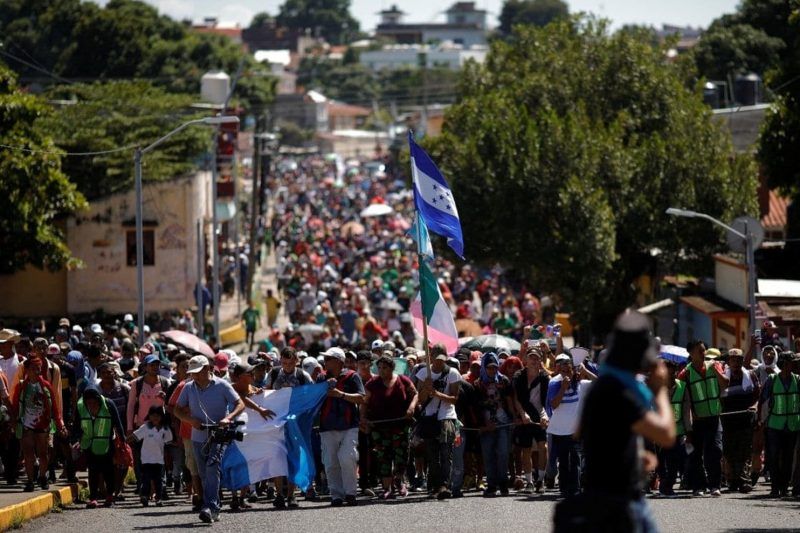 Central American migrants, who are part of a caravan trying to reach the United States, walk on a street as they continue their journey in Tapachula, Mexico, on Monday. (Reuters)