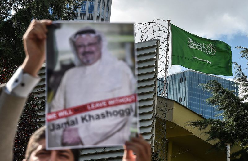 A protestor holds a picture of missing journalist Jamal Khashoggi during a demonstration in front of the Saudi Arabian consulate, on October 5, 2018 in Istanbul. - Jamal Khashoggi, a veteran Saudi journalist who has been critical towards the Saudi government has gone missing after visiting the kingdom's consulate in Istanbul on October 2, 2018, the Washington Post reported. (Photo by OZAN KOSE / AFP) (Photo credit should read OZAN KOSE/AFP/Getty Images)