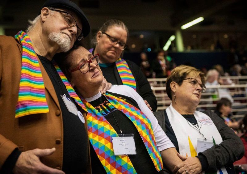 In St. Louis on Feb. 26, 2019, Ed Rowe, left, Rebecca Wilson, Robin Hager and Jill Zundel react to the defeat of a proposal that would allow LGBT clergy and same-sex marriage within the United Methodist Church. (Sid Hastings/Associated Press)