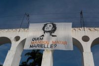 "Who commissioned the murder of Marielle?" asked a banner last month, one year after the murder of the city councilwoman and human rights activist Marielle Franco and her driver, Anderson Gomes. Credit Ian Cheibub / Picture alliance, via Getty Images