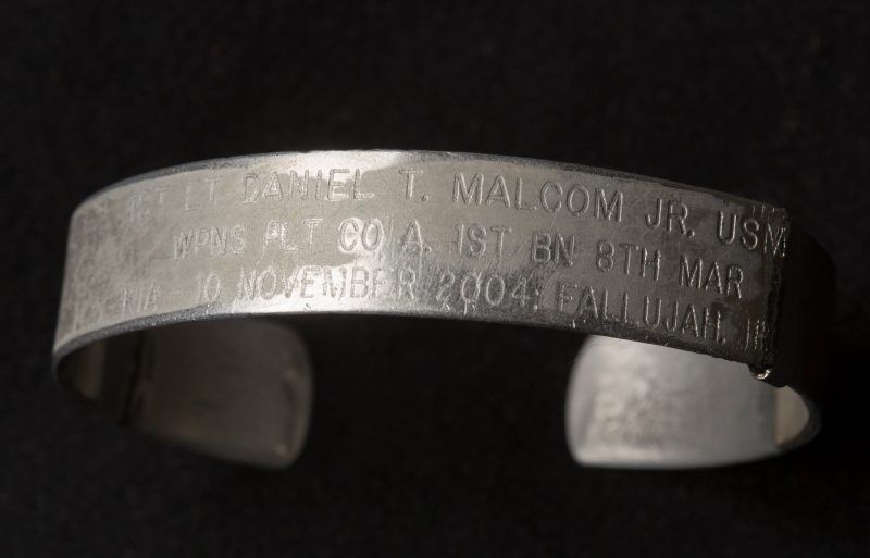 A memorial bracelet that Ackerman wore to honor a fallen comrade. Credit Fred R. Conrad for The New York Times