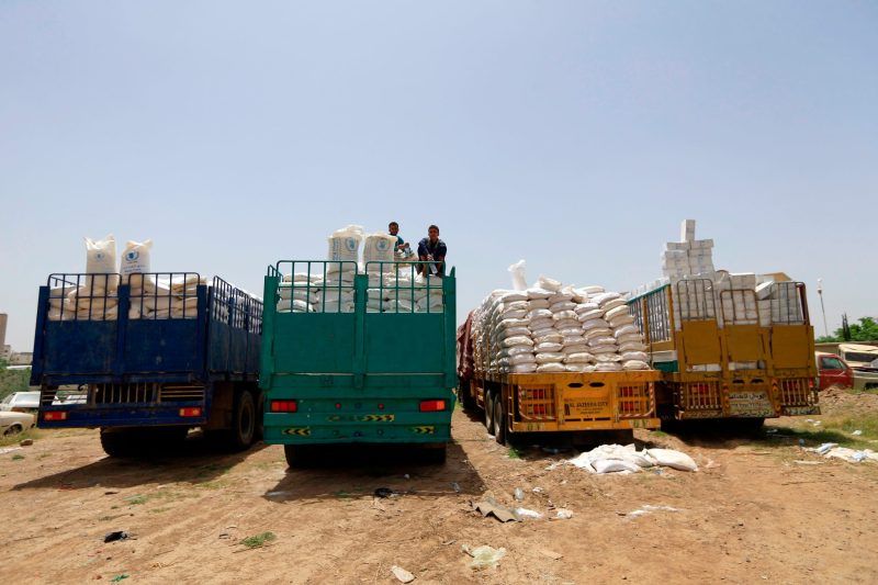 Expired food and medicine aid packages from the World Food Program in the Houthi rebel-held Yemeni capital, Sana, in June. The World Food Programme announced the “partial suspension” of aid to the capital, which is controlled by Houthi rebels. Credit Mohammed Huwais/Agence France-Presse — Getty Images