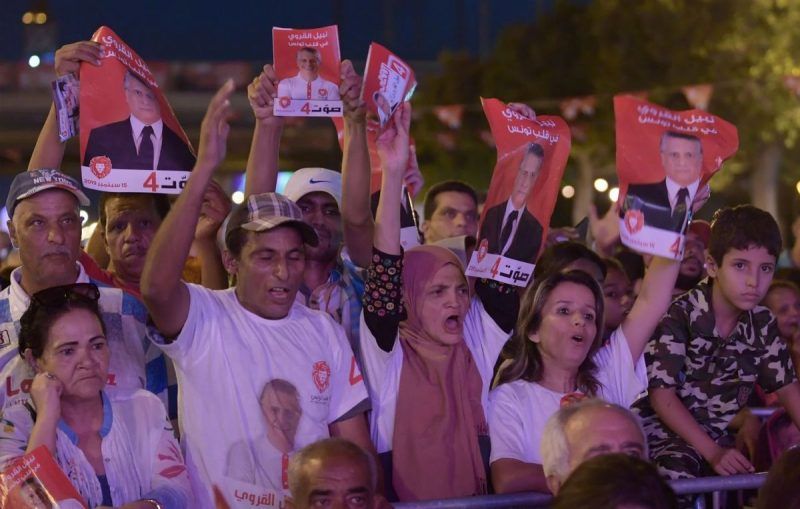 Supporters of Tunisia's jailed presidential candidate, Nabil Karoui, attend a campaign event in Tunis on Friday. (Fethi Belaid AFP/Getty Images)