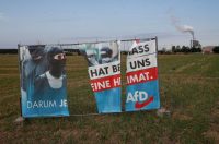 A torn election campaign banner of Germany's far-right Alternative for Germany (AfD) in Saxony. (Wolfgang Rattay/Reuters)