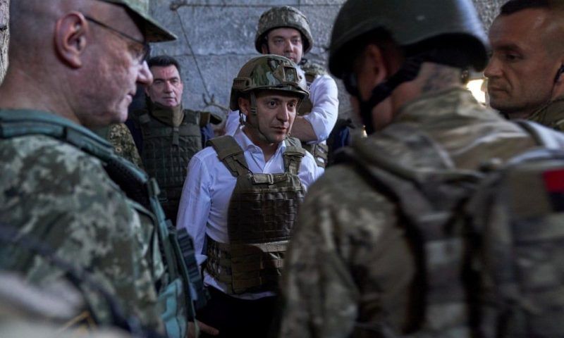 Ukraine’s president Volodymyr Zelenskiy visiting armed forces in the Donetsk region, October 2019. Photograph: Ukrainian Presidential Press Ser/Reuters