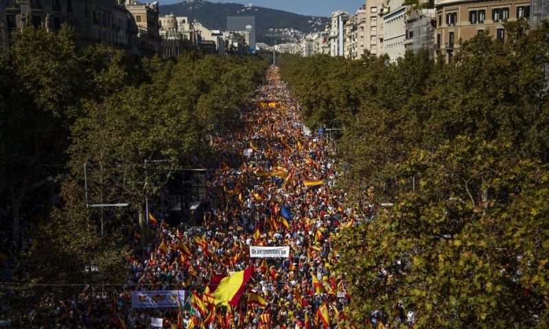 Demonstrators march in support of Catalonia remaining part of Spain, Barcelona, 27 October 2019. Photograph: Emilio Morenatti/AP