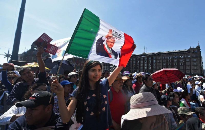 Simpatizantes de Andrés Manuel López Obrador, presidente de México, en la celebración de su primer aniversario de Gobierno. (PEDRO PARDO/AFP via Getty Images)