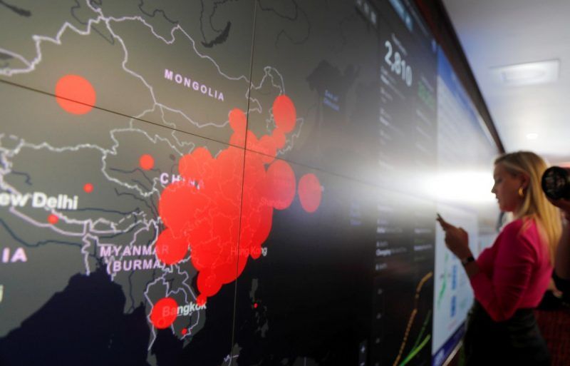 A global map at the Department of Health and Human Services showing where the known outbreaks of the coronavirus have occurred. Credit Carlos Barria/Reuters