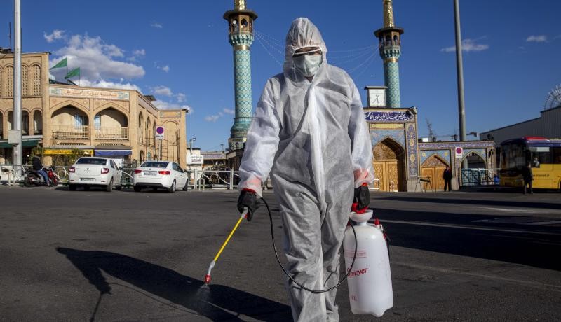  Spraying disinfectant at Tajrish bazaar in Tehran, Iran, during the coronavirus pandemic in March 2020. Photo by Majid Saeedi/Getty Images. 