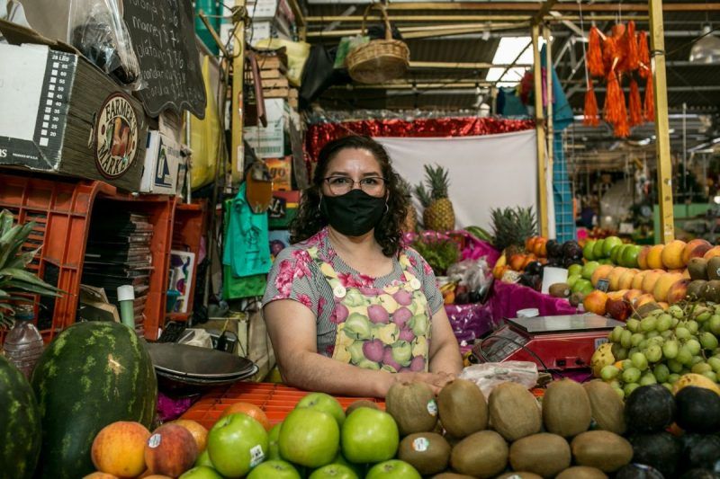 Carina González has worked in Mercado la Dalia in Mexico City for 25 years. Stalls such as hers are part of Mexico's informal economy, which accounts for 30 percent of the country's gross domestic product. (Meghan Dhaliwal for The Washington Post)