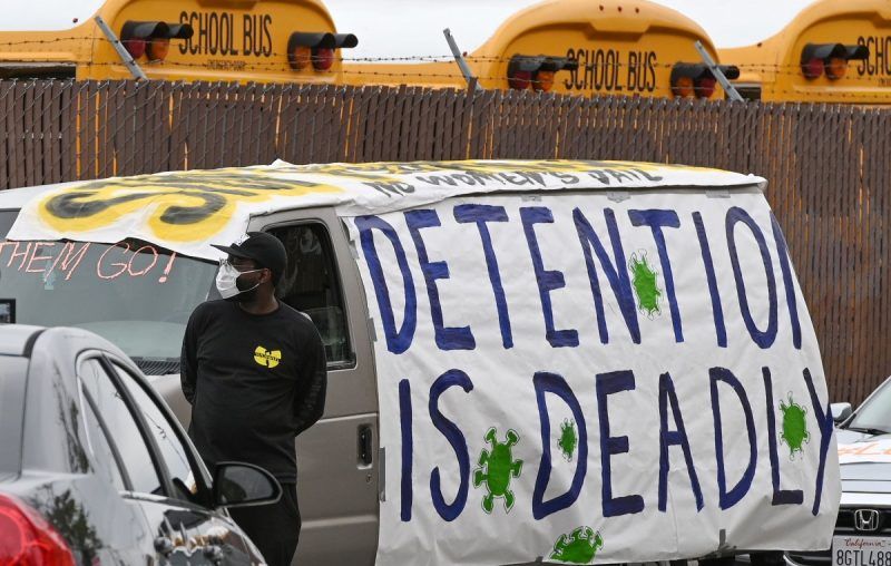 Human rights activists prepare for a car caravan protest through downtown Los Angeles to call on officials to release inmates from jails to prevent the spread of coronavirus on April 7. (Robyn Beck/Afp Via Getty Images)