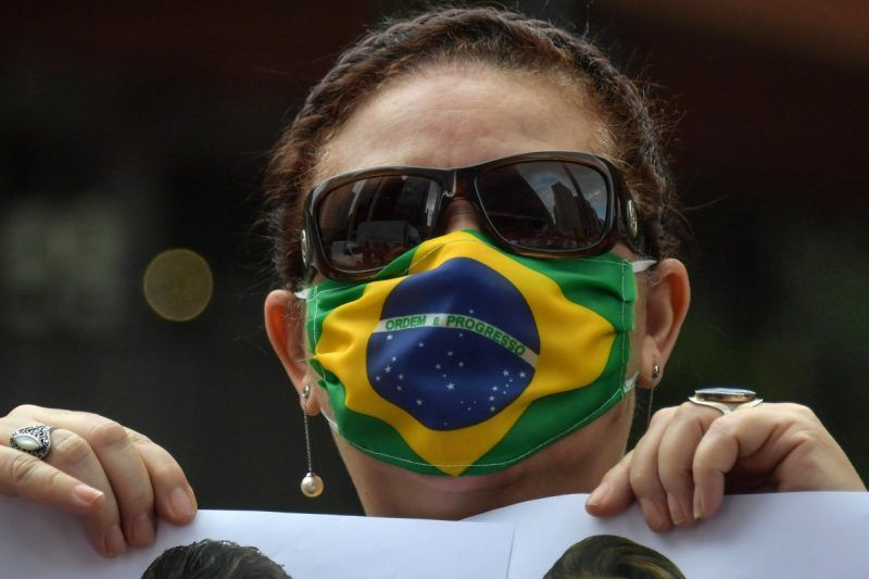 A supporter of President Jair Bolsonaro takes part in a protest in Sao Paulo, Brazil, on May 1, over the quarantine and social distancing measures imposed to combat the coronavirus. (Nelson Almeida/AFP/Getty Images)