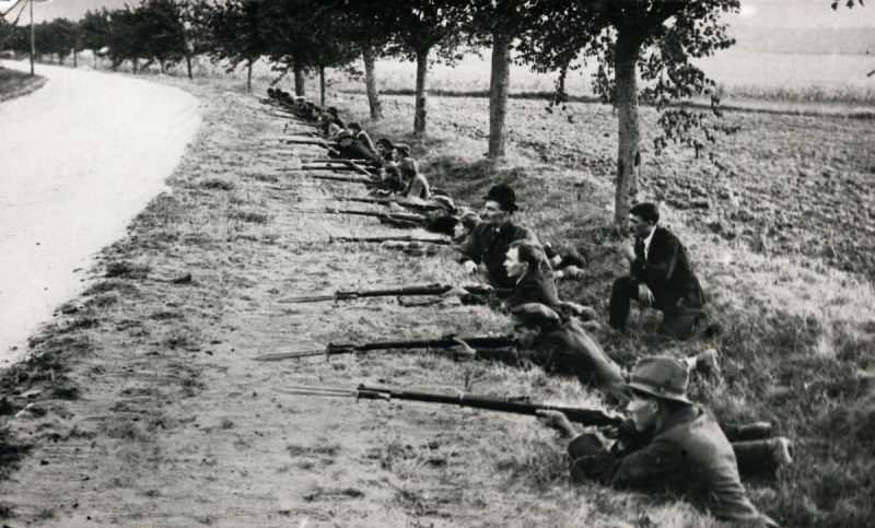 George Rinhart/Corbis via Getty Images. Armed Hungarians attempting to prevent entry of Austrian troops, despite the efforts of the Hungarian government to avoid a clash following implantation of the Treaty of Trianon, Hungary, 1921
