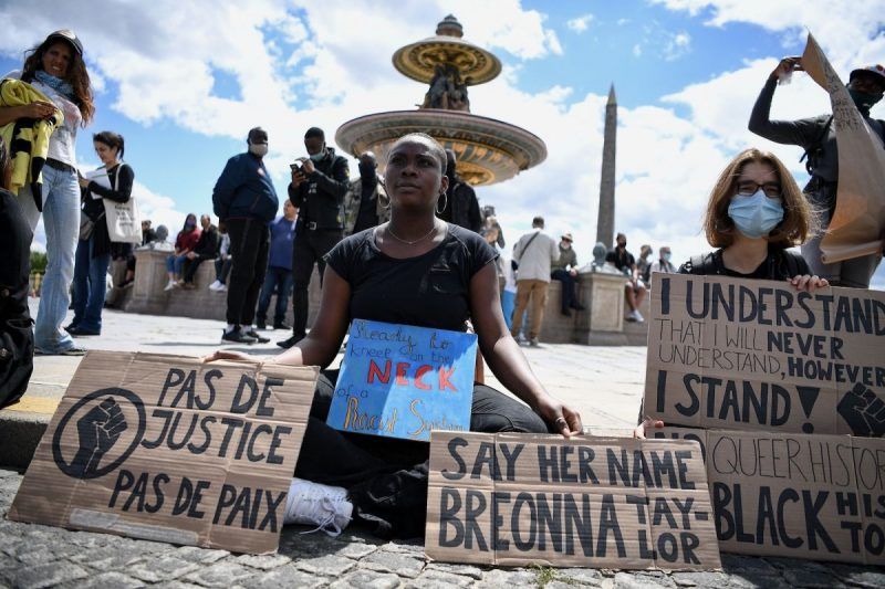 Anne-Christine Poujoulat/AFP via Getty Images. Protesters at the Place de la Concorde, Paris, France, June 6, 2020