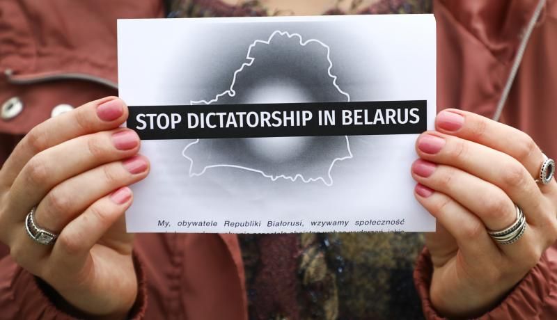  People protest at a rally of solidarity with political prisoners in Belarus. Photo by Beata Zawrzel/NurPhoto via Getty Images. 