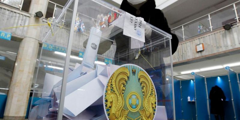 Voting during Kazakhstan's 2021 parliamentary election in Nur-Sultan. Photo by STRINGER/AFP via Getty Images. 