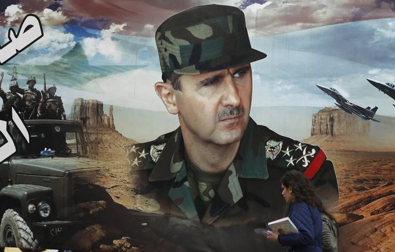 Un portrait de Bachar al-Assad dans une rue de Damas, en mars 2019. (LOUAI BESHARA/AFP)