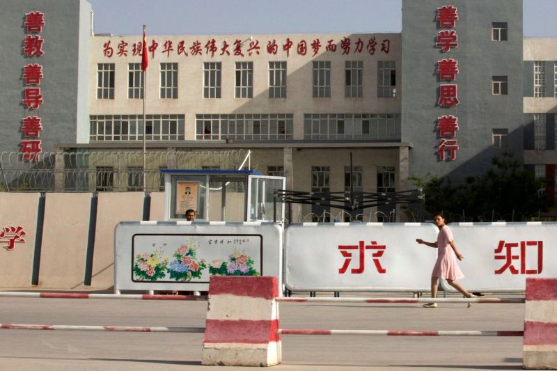 The Chinese government blocks most foreign journalists from reporting from Xinjiang. This photo from 2018 shows a fortress-like middle school in Kashgar. (Ng Han Guan/AP)